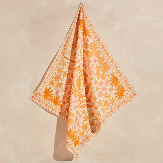 Tropisk bandana eller tynt skjerf i oransje toner